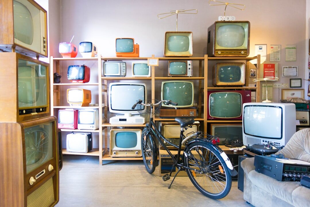 Retro television control room with analog switchboards and monitors