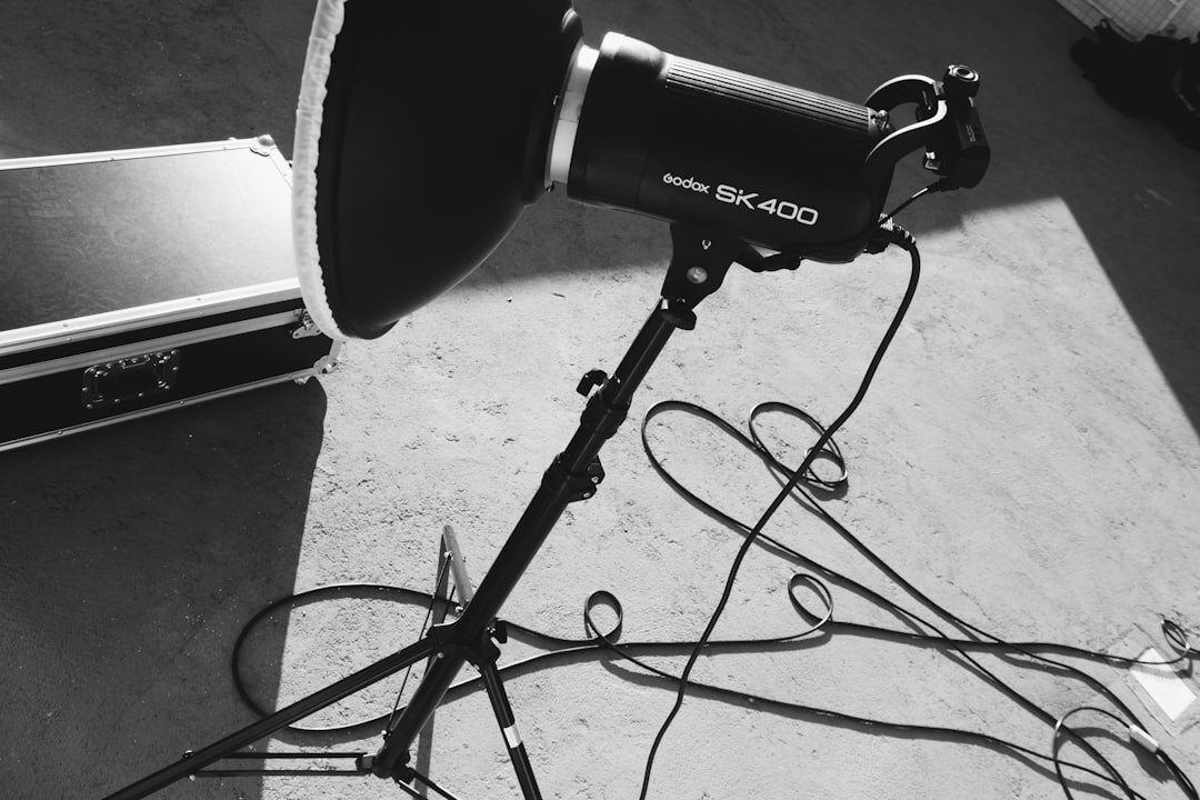 Vintage film set with a clapperboard and studio lighting rig